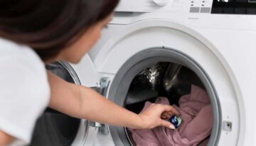 woman-using-capsule-wash-her-clothes_23-2149117041